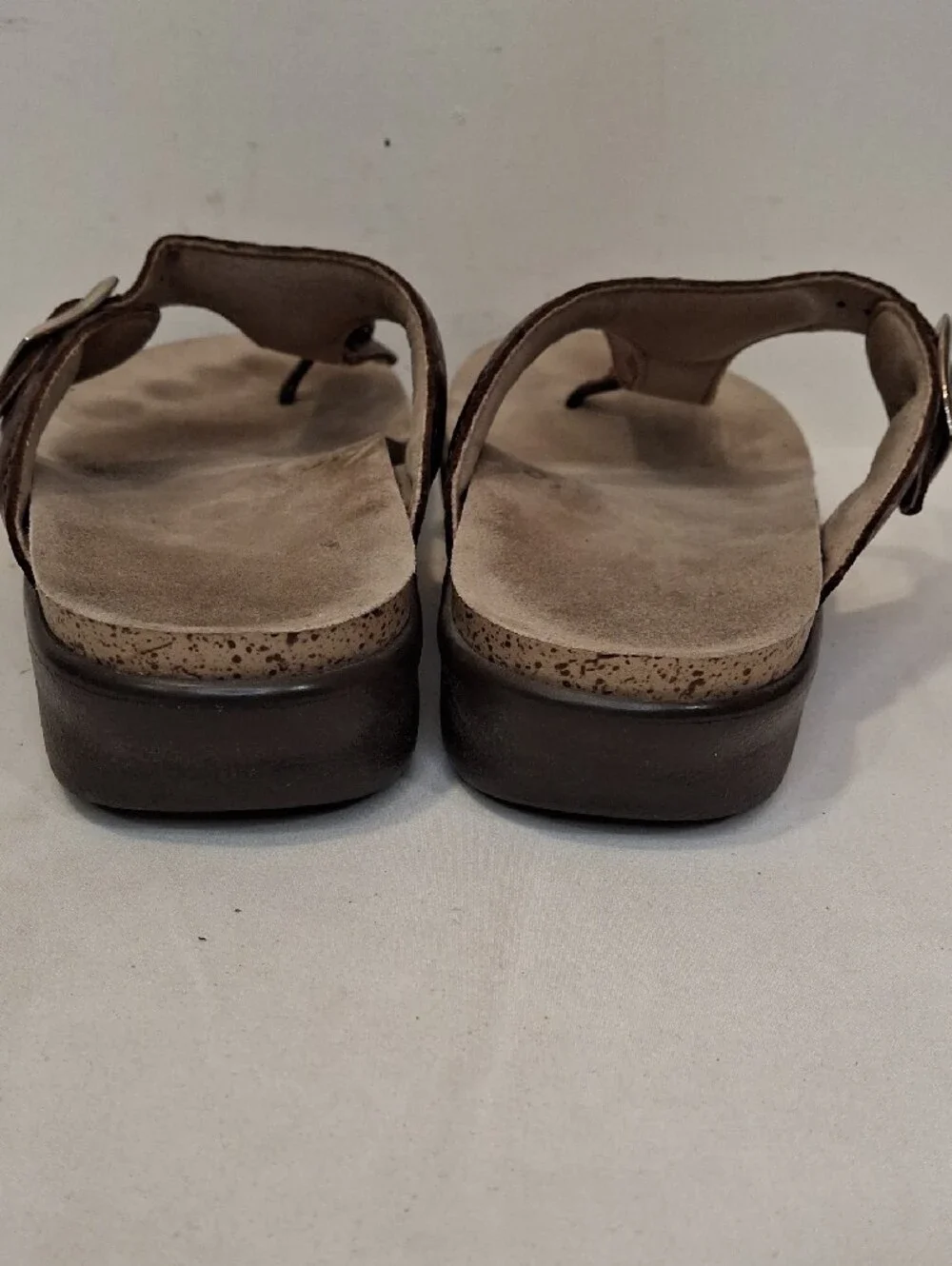 SAS Sanibel Metallic Bronze Gold Thong T Strap Sandals with Gold Buckle Detail.
